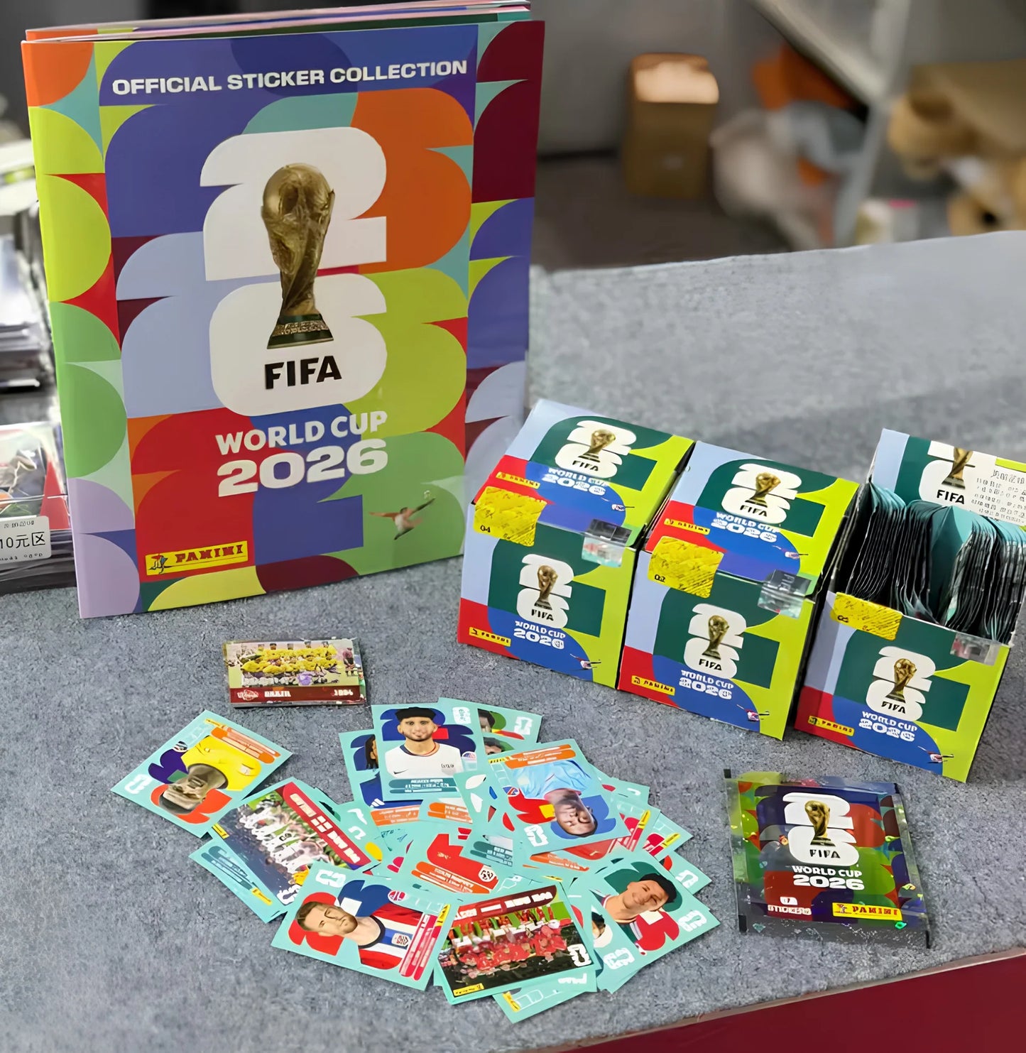 Colección oficial de cromos del Mundial 2026™ Caixa com 50 Pacotes + Álbum Oficial